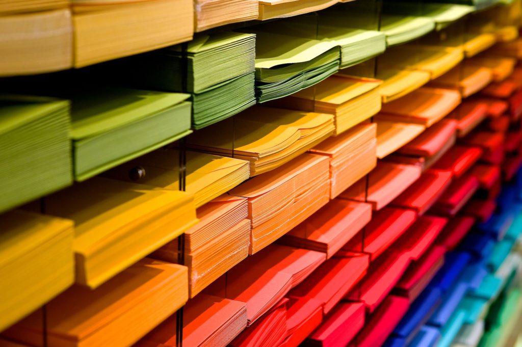 Multi Colored Folders Piled Up privacy policy Louise Mila